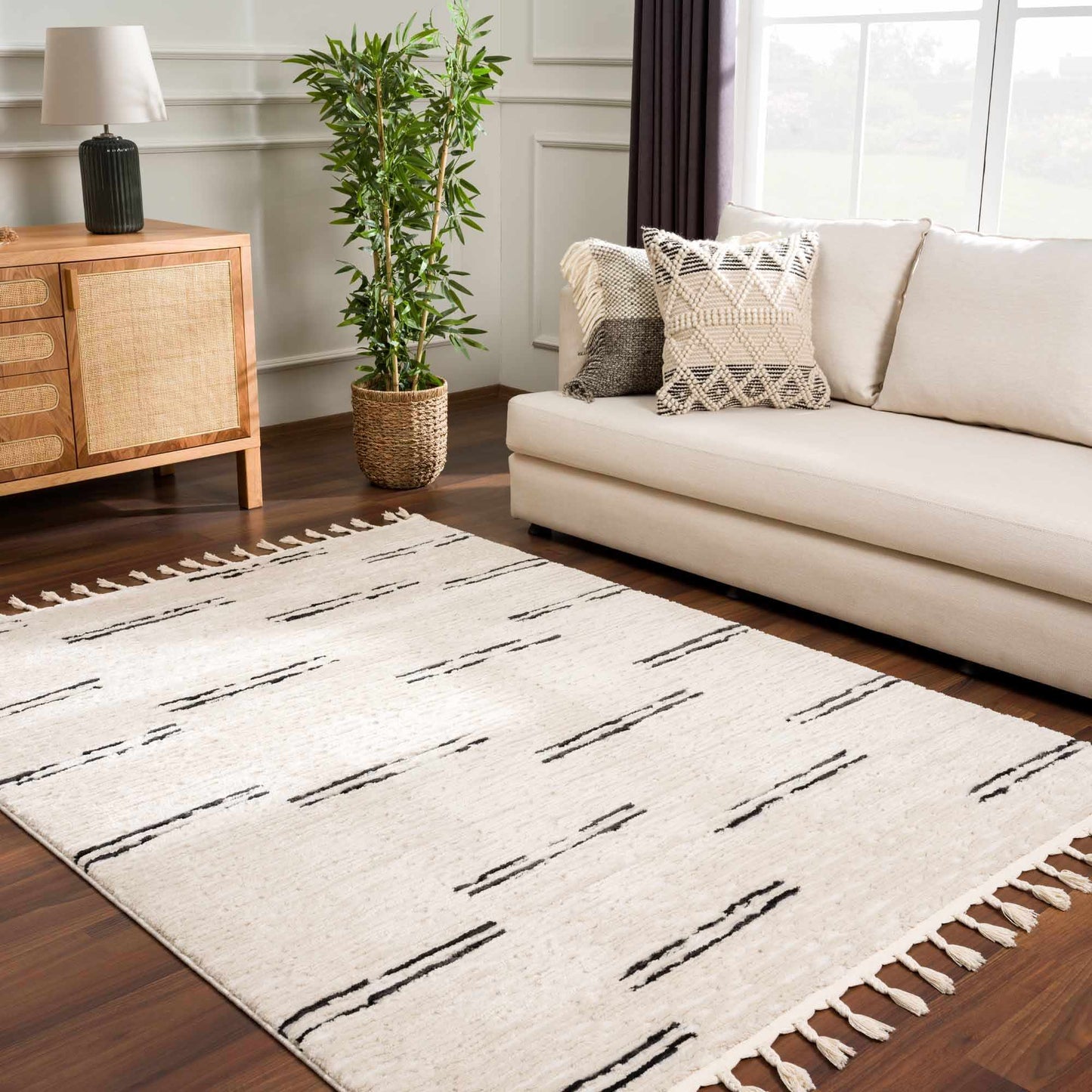 Riad Black Striped White Area Rug with tassels