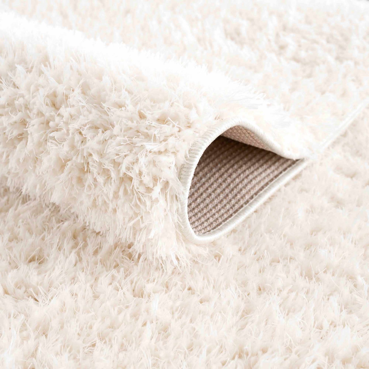 Faina Solid Cream Shag Rug Washable