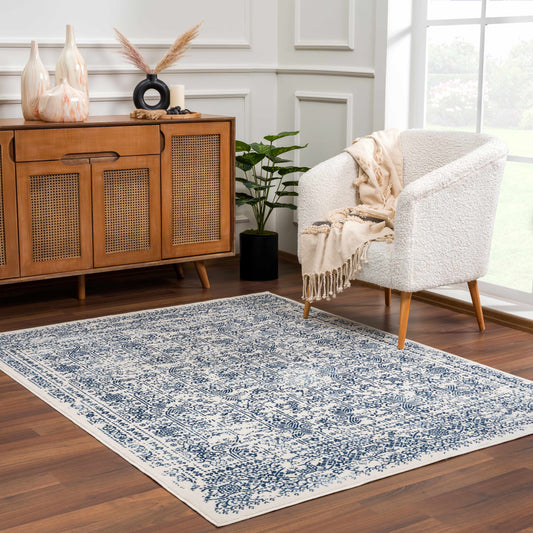 Michie Blue Area Rug - Clearance