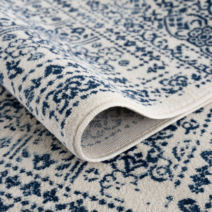 Michie Blue Area Rug - Clearance