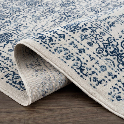 Michie Blue Area Rug - Clearance