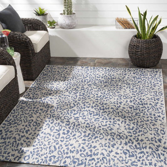 Alfombra de rendimiento Skipsea con estampado de leopardo azul